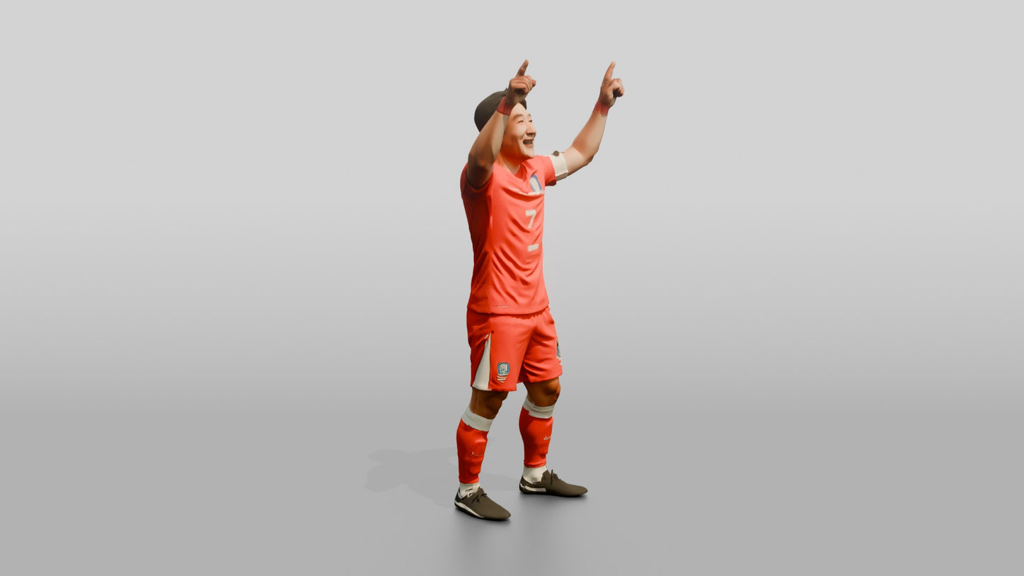 Soccer Player Pointing to the Sky