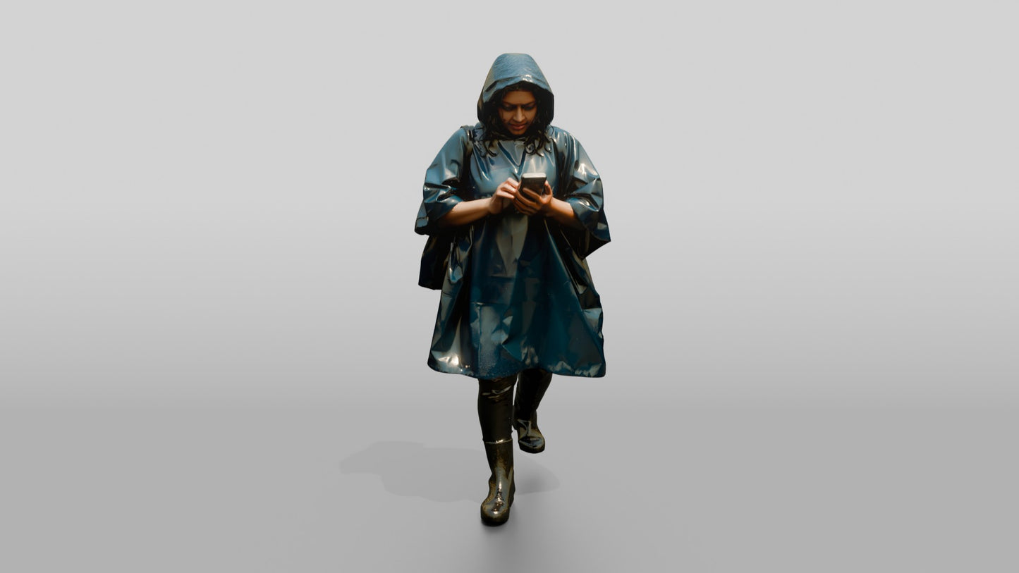 Indian Woman in Blue Poncho Checking Phone