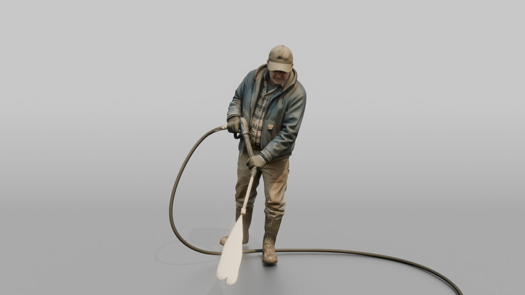 Farmer Spraying Down Concrete Barn Floor