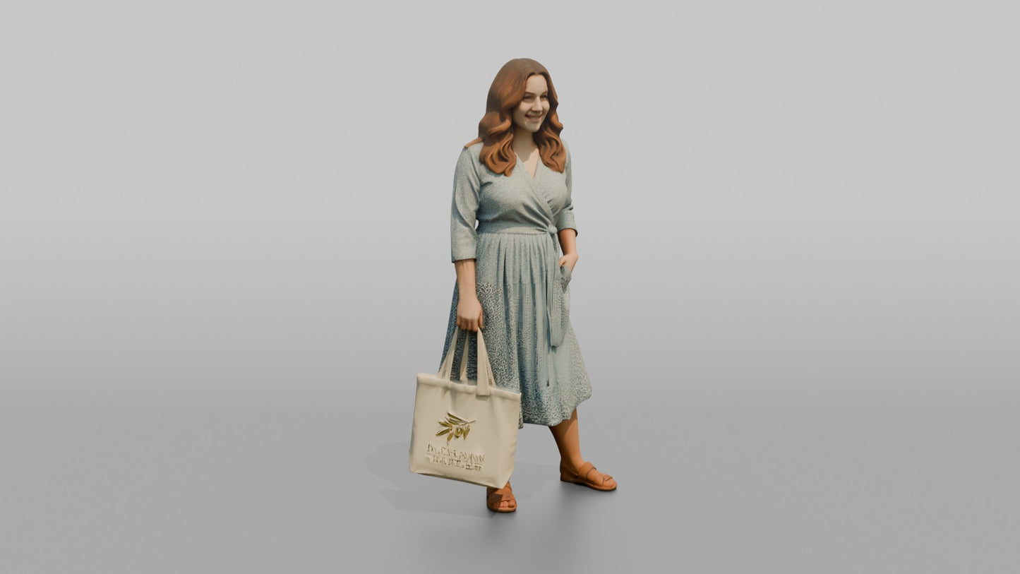 Woman Posing in a Wrap Dress Holding a Canvas Bag