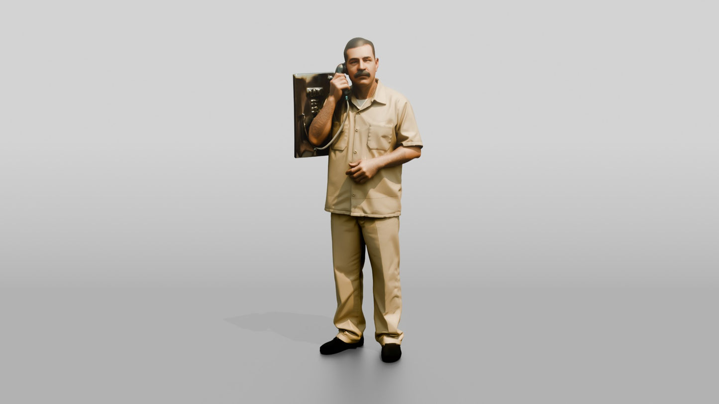 Latino Male Prisoner in a Khaki Uniform Holding a Phone Receiver