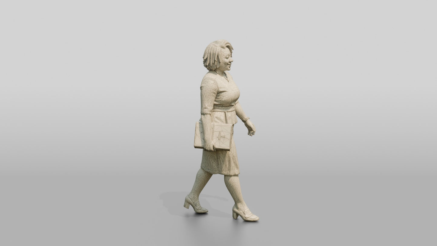 Businesswoman Walking with a Folder