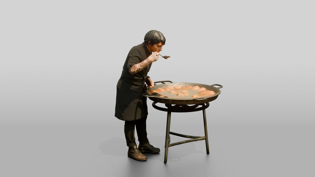 Chef Checking a Paella Pan