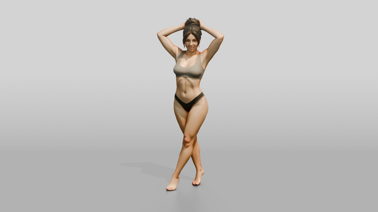 Woman in Black Two-Piece Swimsuit with Arms Raised