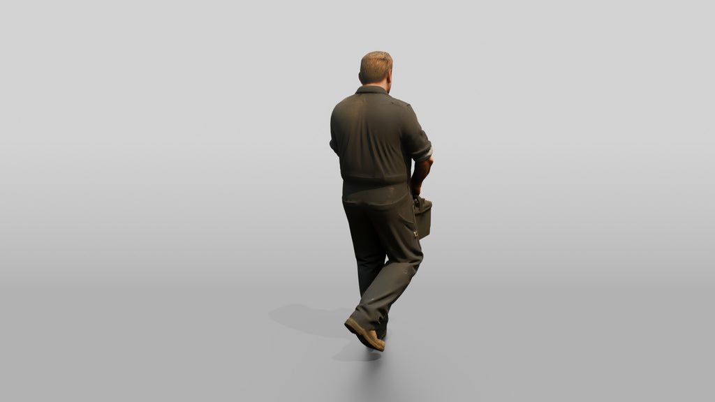 Mechanic Carrying a Car Battery