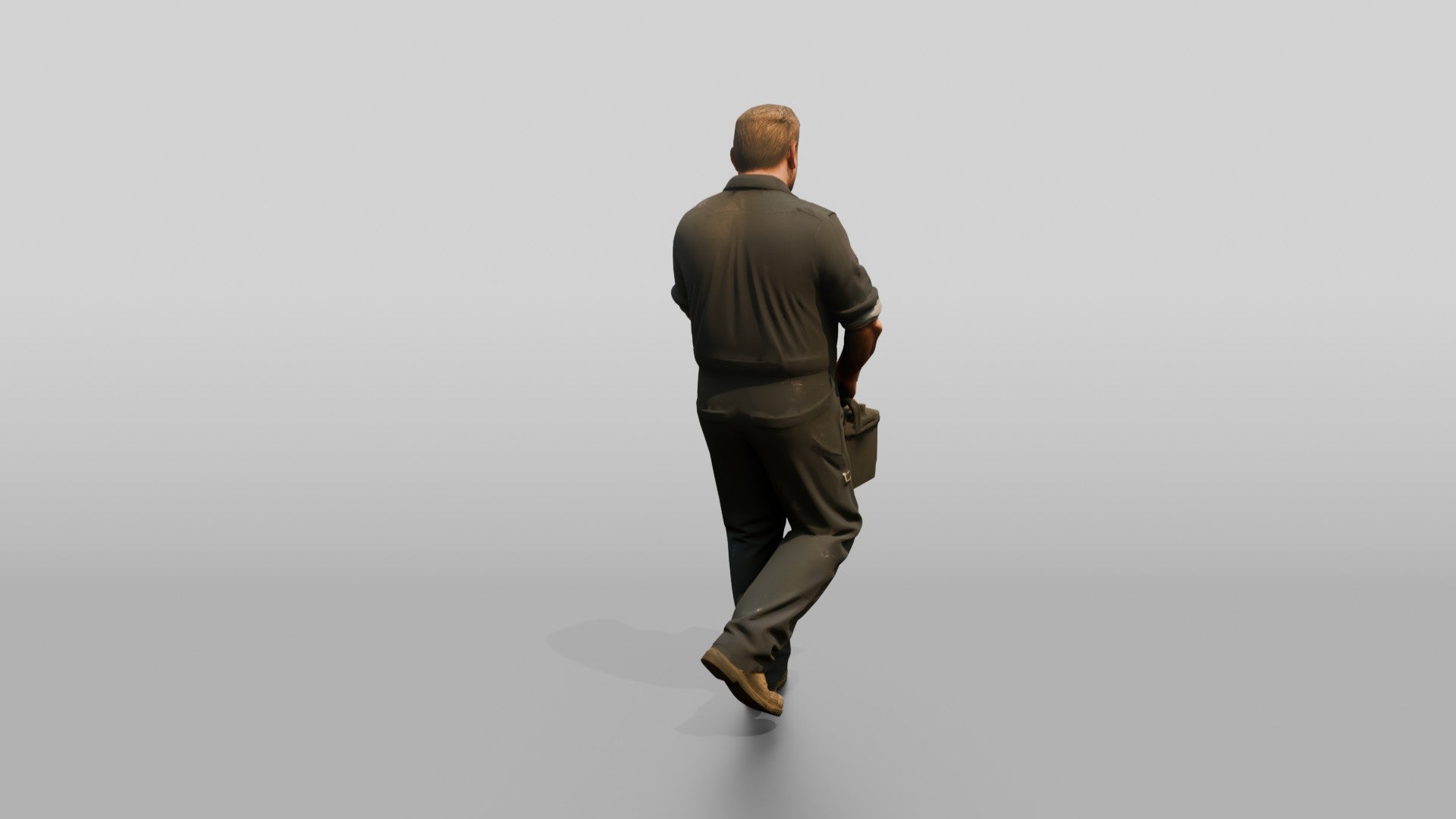 Mechanic Carrying a Car Battery