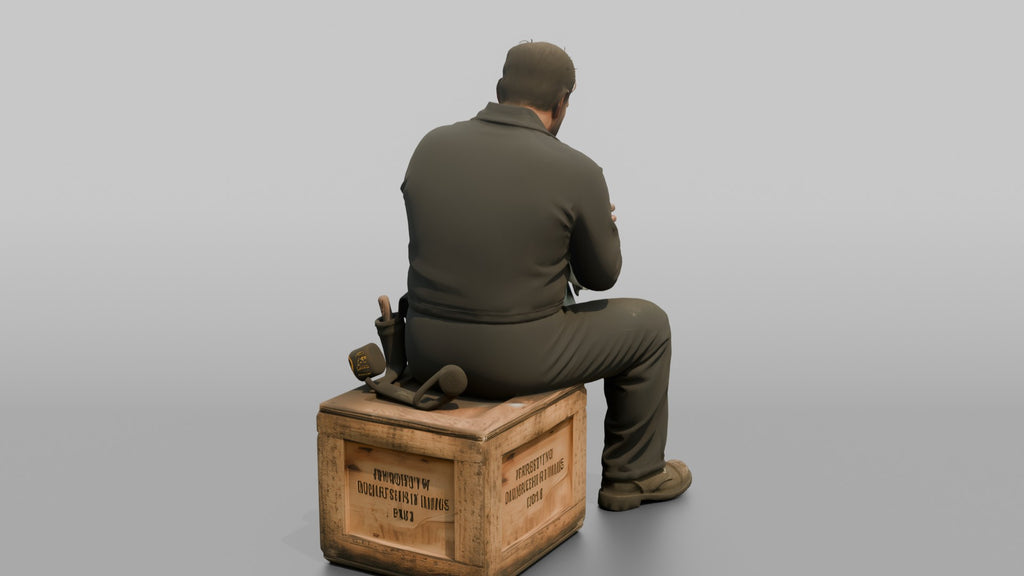 Engineer Resting on a Crate After a Long Shift