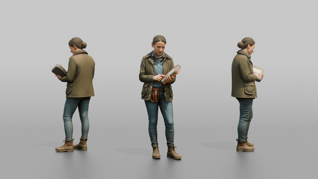 Farmer Holding Livestock Health Monitor Device