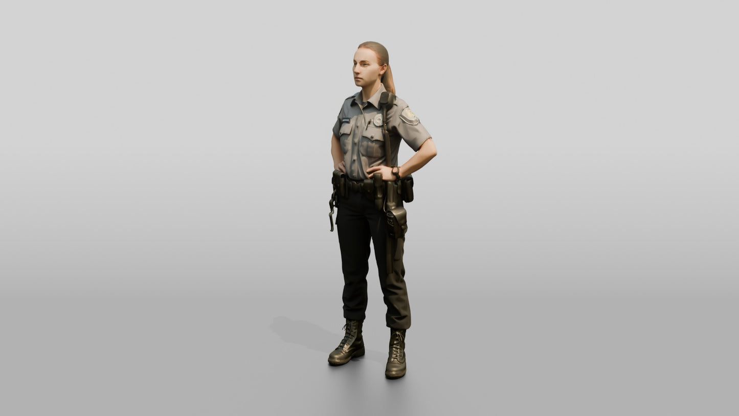Caucasian Female Guard in a Grey Patrol Shirt and Dark Trousers