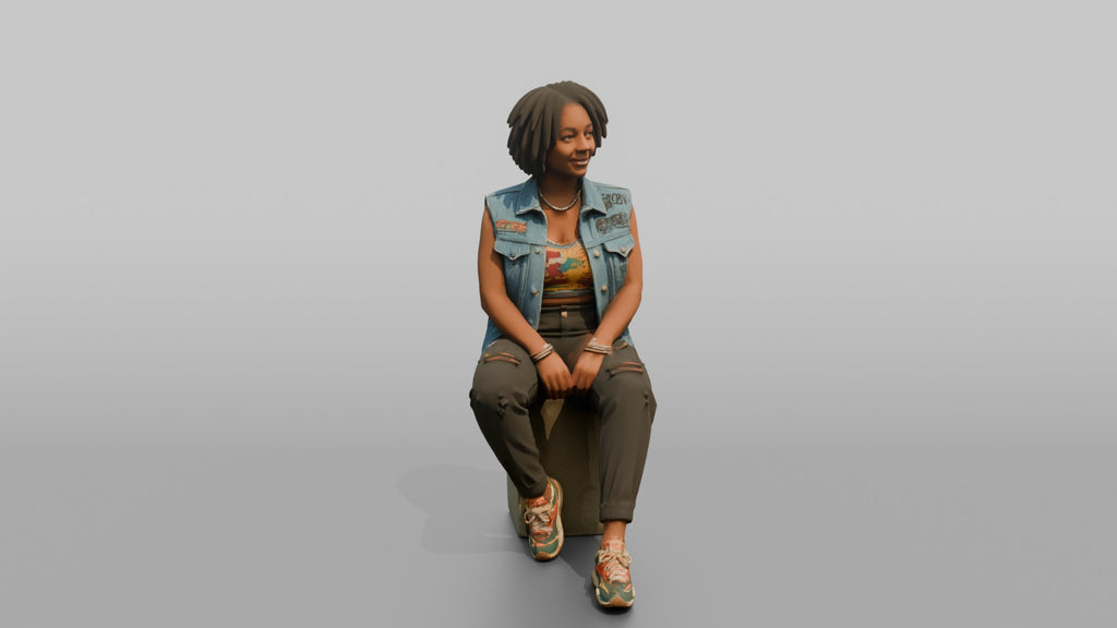 African Woman in Denim Vest Sitting on Concrete Block