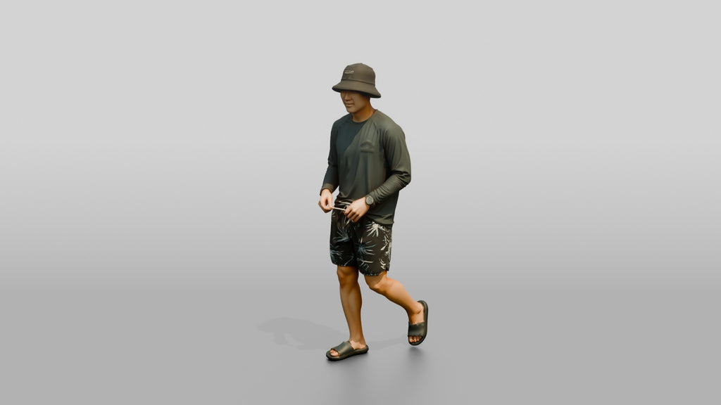 Man Loosening Drawstring on Boardshorts