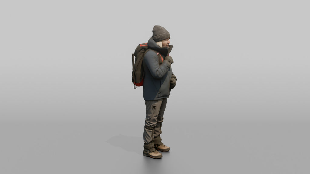 Winter Hiker Zipping Up Her Jacket