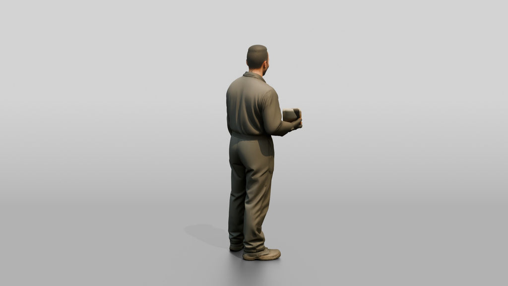 Mechanic Holding Spark Plugs