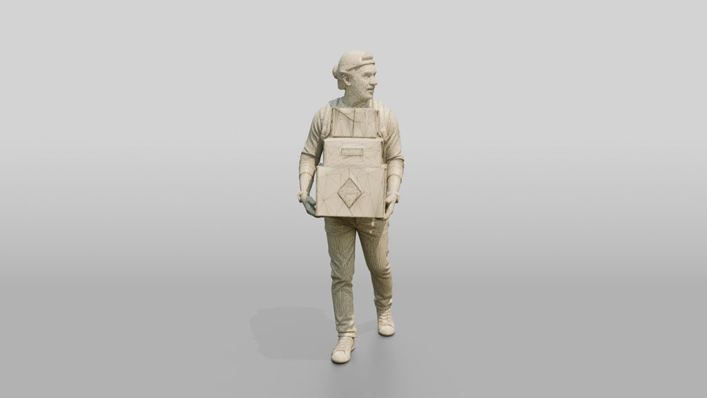 Man Carrying Stacked Boxes