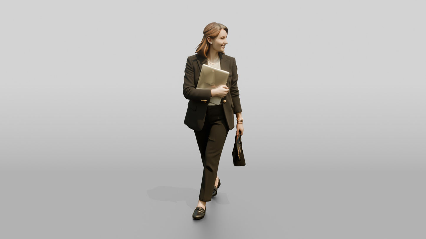 Woman Carrying a Laptop to a Meeting