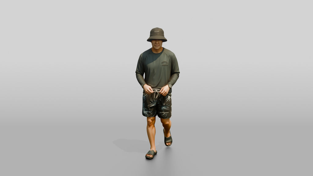 Man Loosening Drawstring on Boardshorts