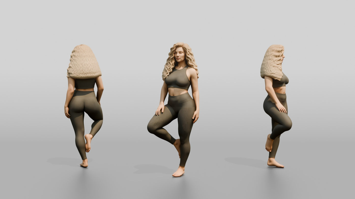 Blonde Woman in Charcoal Activewear in Tree Pose