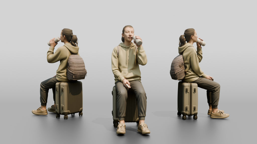Young Woman Seated on Suitcase Drinking from Travel Cup