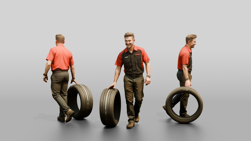 Mechanic Rolling a Performance Tire