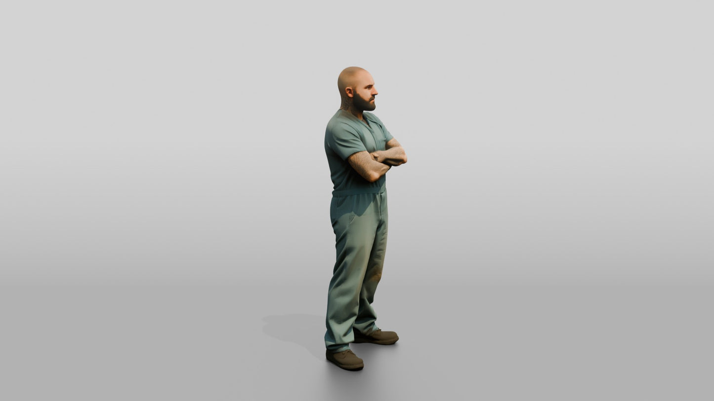 White Male Prisoner Standing with His Arms Crossed Defensively