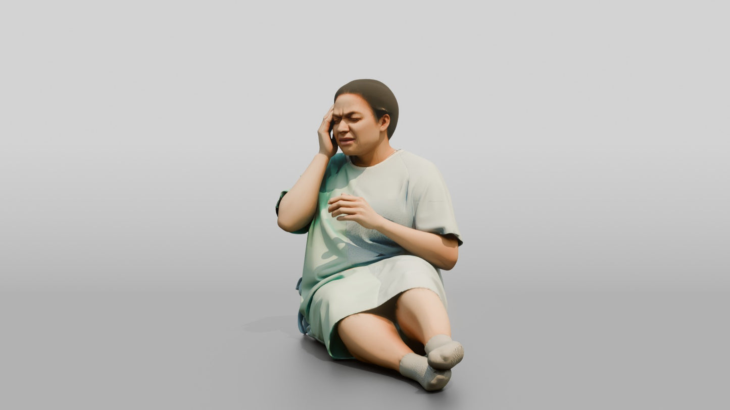 Woman Patient Sitting with a Headache