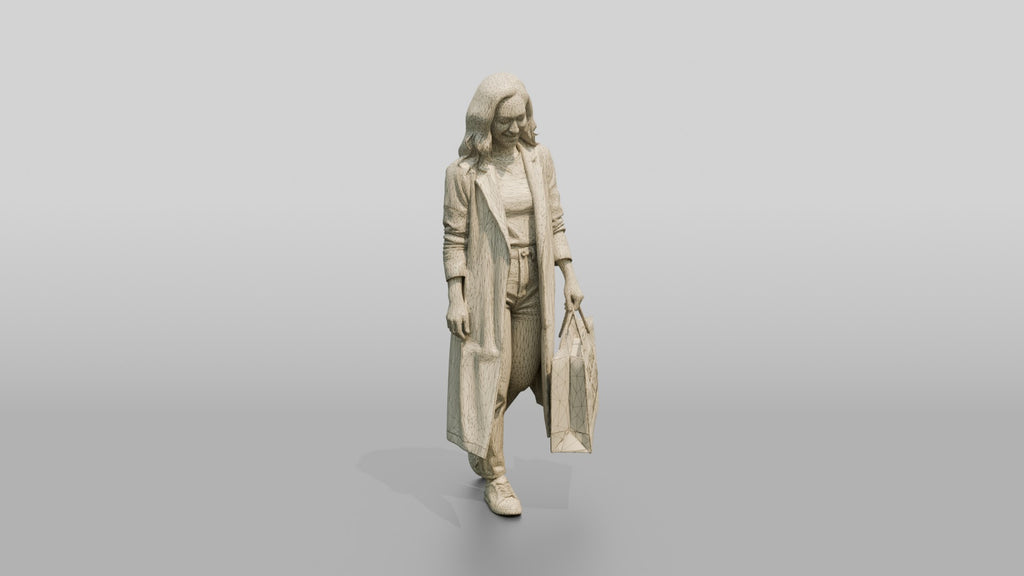 Woman in Long Olive Coat Walking with Luxury Shopping Bag