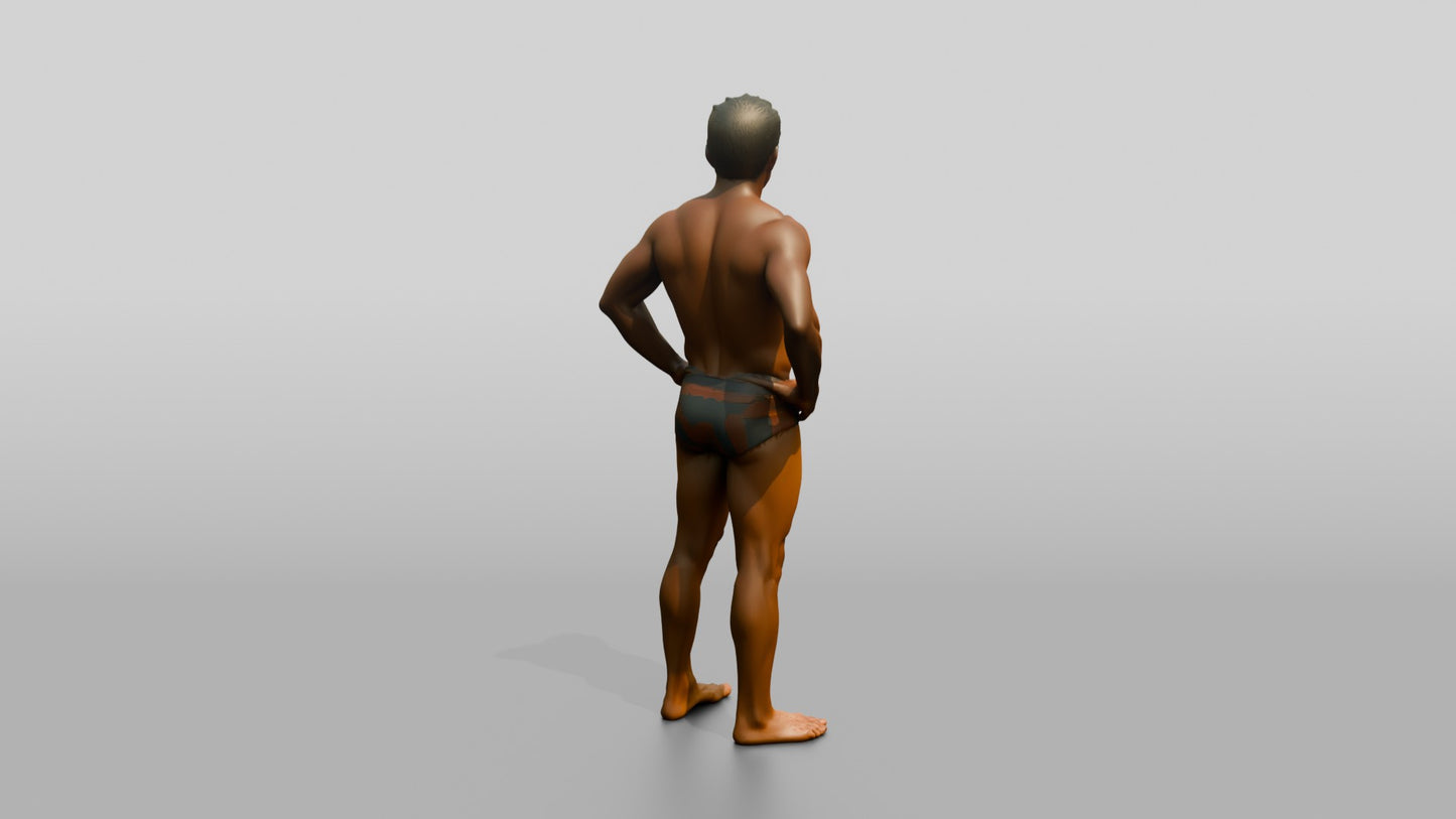 Mestizo Man Standing in Bold Patterned Swim Brief