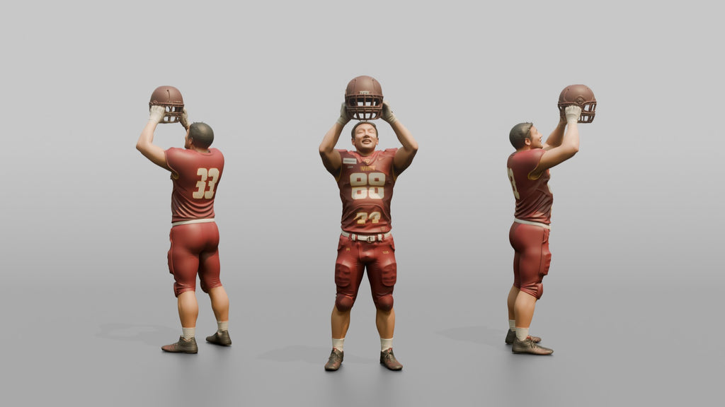 Player Raising His Helmet Triumphantly