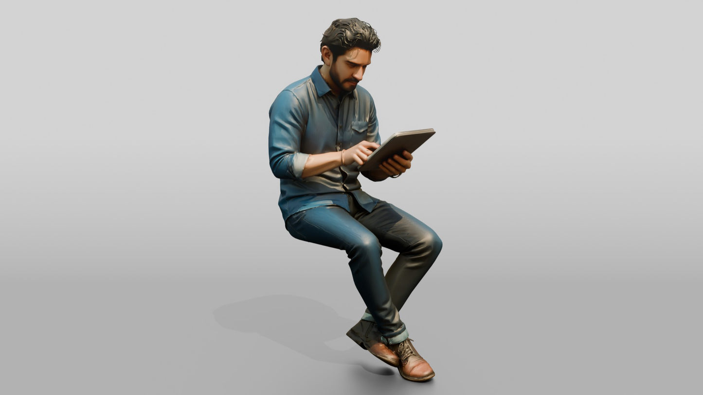 Man Using a Tablet on a Stool
