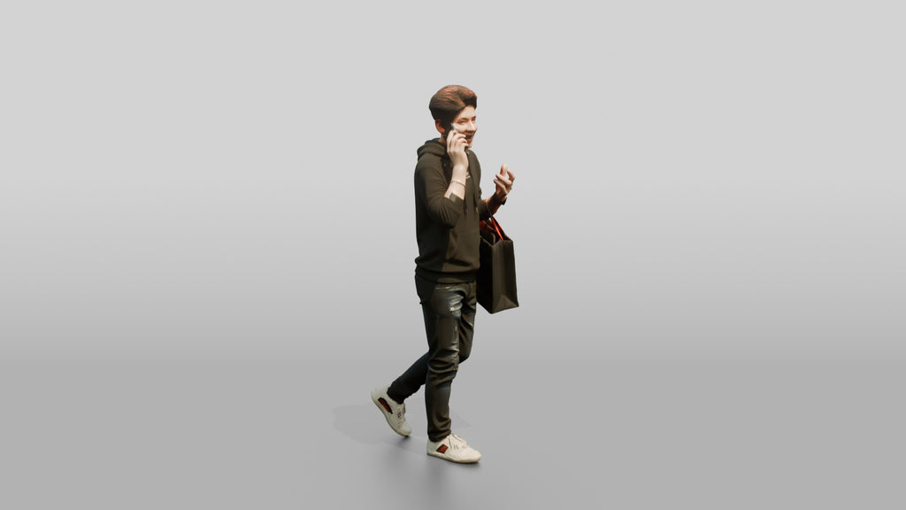 Young Chinese Man Shopping and Talking on Phone