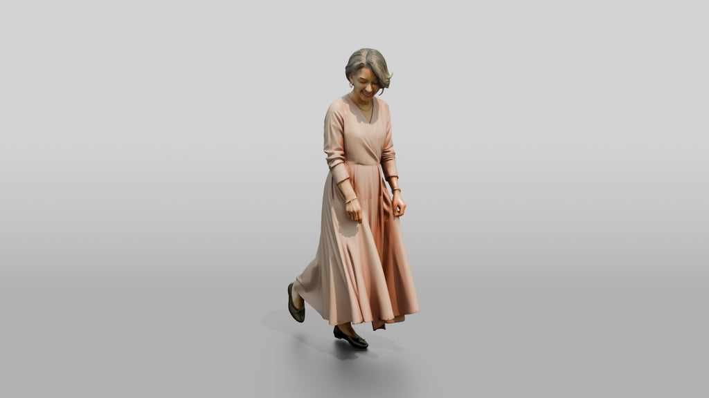 Elegant Woman in Flowing Pink Dress