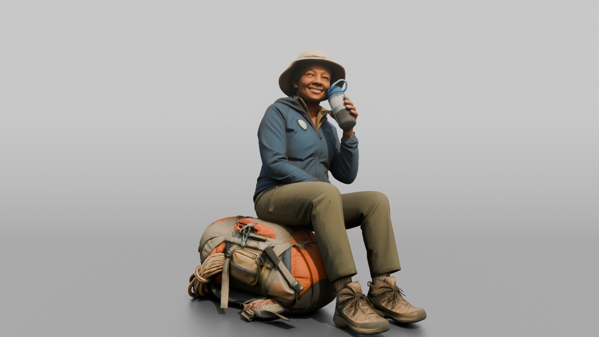 Hiker Sitting on Her Backpack, Taking a Break