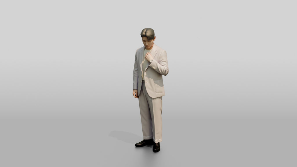 Man Adjusting Collar in Lavender Suit