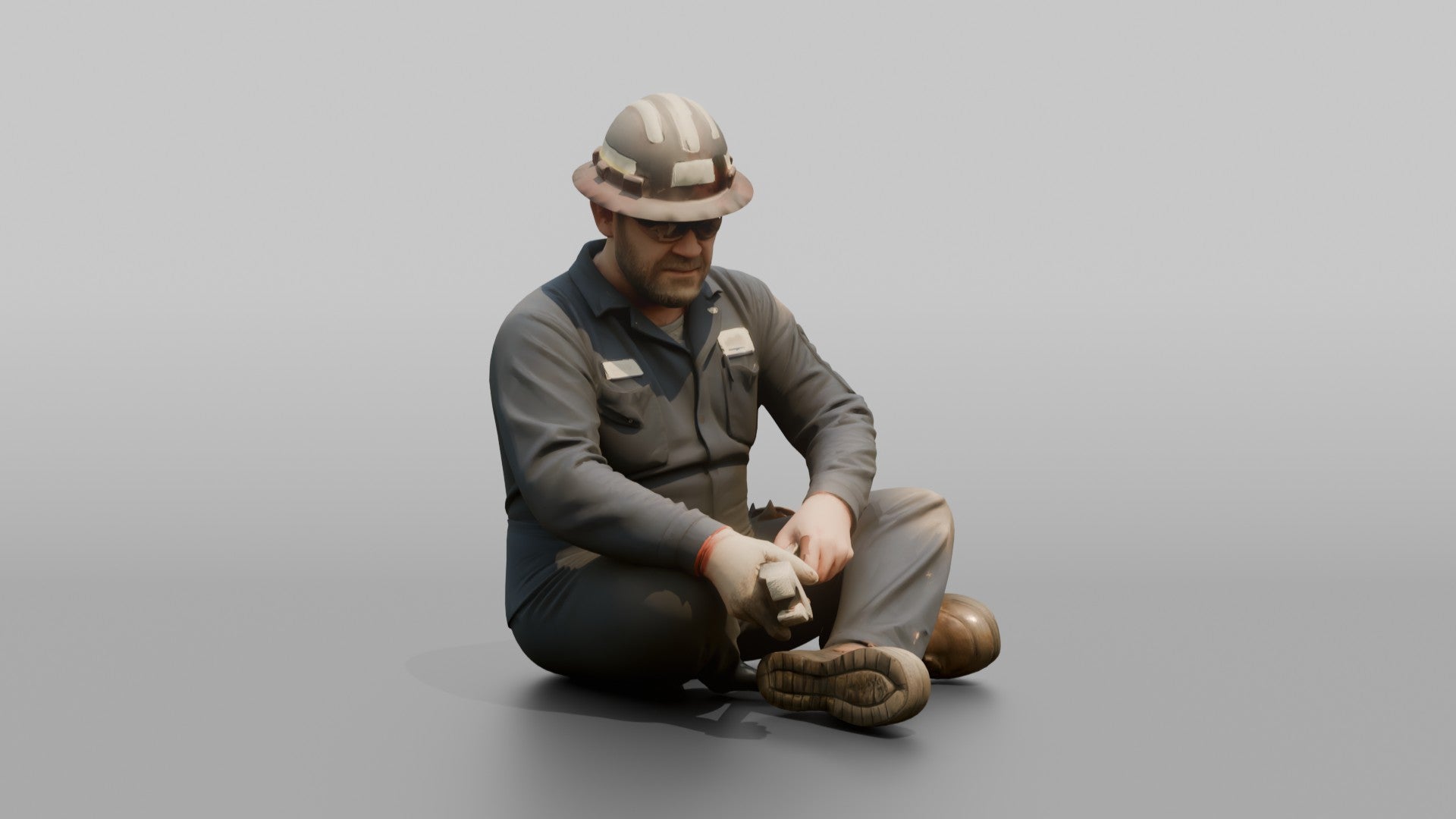 Engineer Tightening a Bolt on a Pipe Fitting