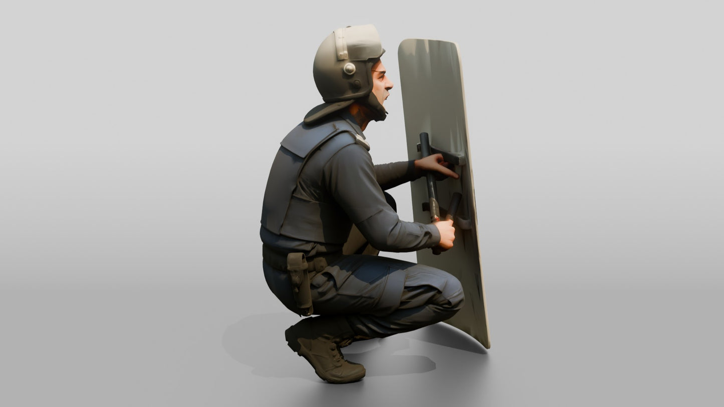 Riot Police Officer Crouching Behind Shield