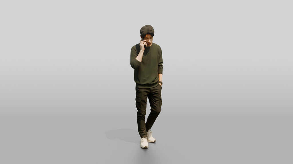 Young Chinese Man Walking and Talking on Phone